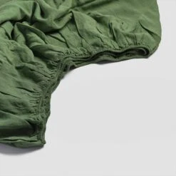 Forest Green Linen Sheet Set 11 Forest Green Linen Sheet Set -Piglet Piglet in Bed Fitted Sheet Forest Green Detail 1300x1300 fa3e65d4 780d 418d be4c 4592c89a513b