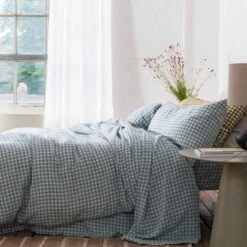 Warm Blue Gingham Linen Sheet Set -Piglet Piglet in Bed Gingham Linen Bedding Warm Blue Lifestyle 1 266d37c9 8722 4535 be4e 7997df8ced41