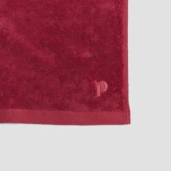 Mineral Red Organic Cotton Bath Sheet -Piglet PigletinBed BathroomCollection OrganicCottonDetail MineralRed 1 GreyBG