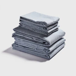 Sky Blue Seersucker Cotton Bedtime Bundle -Piglet PigletinBed SeersuckerCottonBedtimeBundle SkyBlue 1 greyBG a4ddc17f 750e 4318 a6f1 693cf6514045