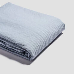 Sky Blue Seersucker Cotton Bedtime Bundle -Piglet PigletinBed SeersuckerCottonDuvetCover SkyBlue 1 greyBG e1676194 a748 4c11 8acb 9d27951aa847