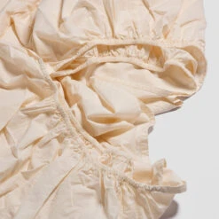 Cloud Cream Seersucker Cotton Bedtime Bundle 13 Cloud Cream Seersucker Cotton Bedtime Bundle -Piglet PigletinBed SeersuckerCottonFittedSheet CloudCream 2 greyBG c282a960 f2c0 4cf6 839d 83429acf8503